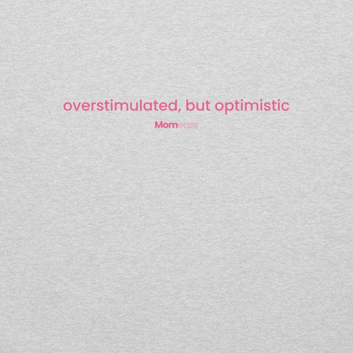 Overstimulated But Optimistic hoodie in heather grey, front view with the phrase printed across the chest