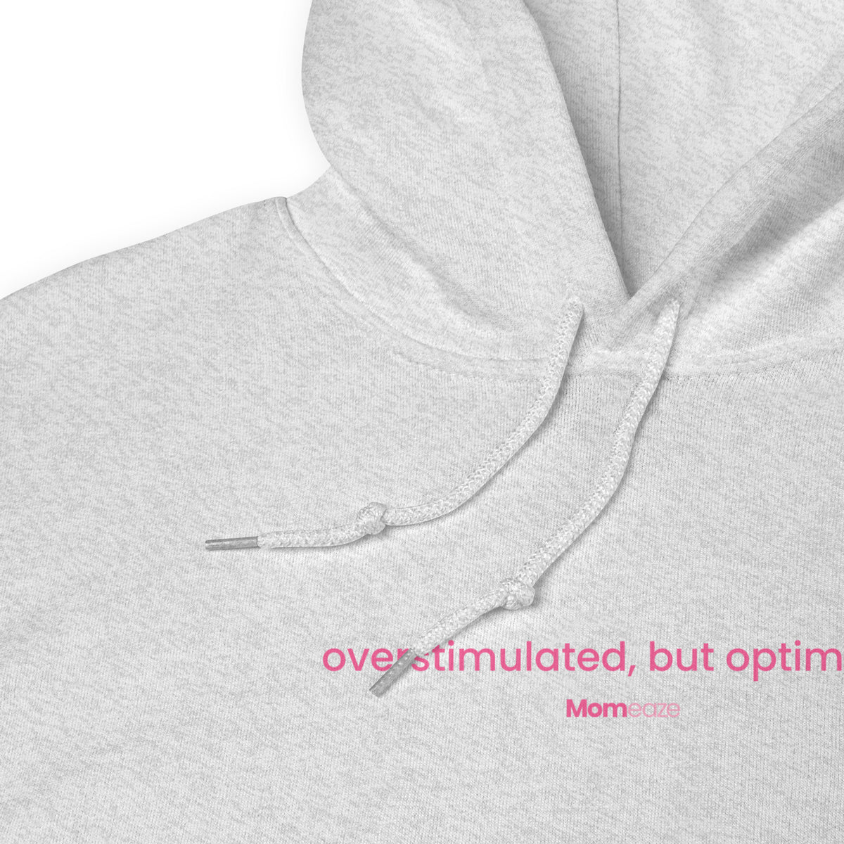 Close-up of the heather grey hoodie showing the front pouch pocket, ribbed cuffs and drawcord